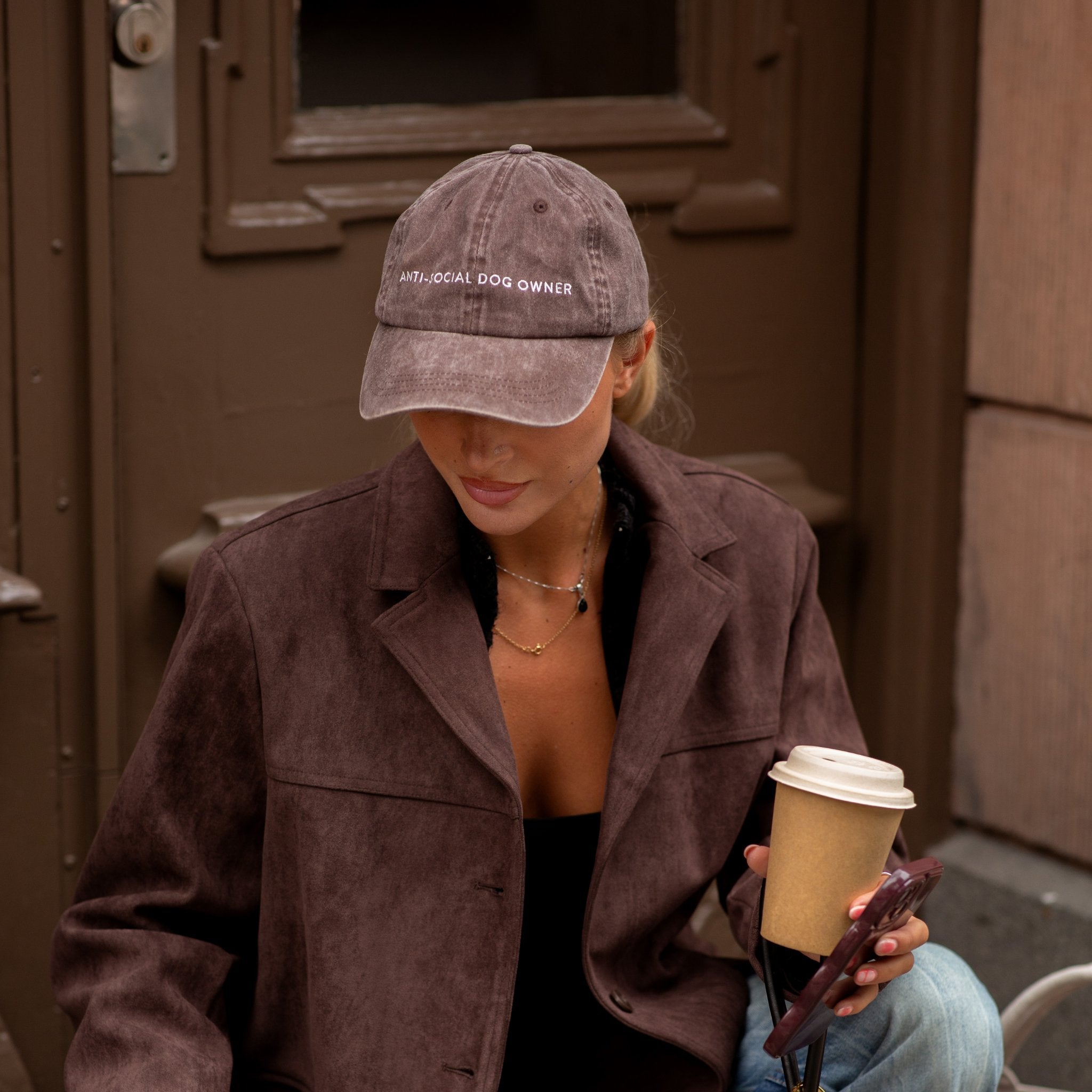brown-denim-cap-anti-social-dog-owner-woman.jpg